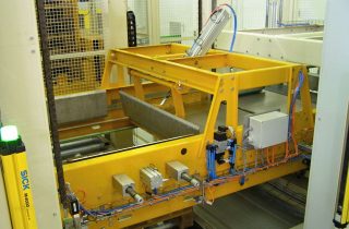 1. Low infeed palletizer for PET bottle packs