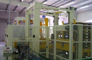 4. Low infeed palletizer for PET bottle packs